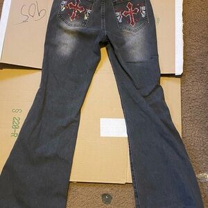 SHEIN jeans with red and silver designs
